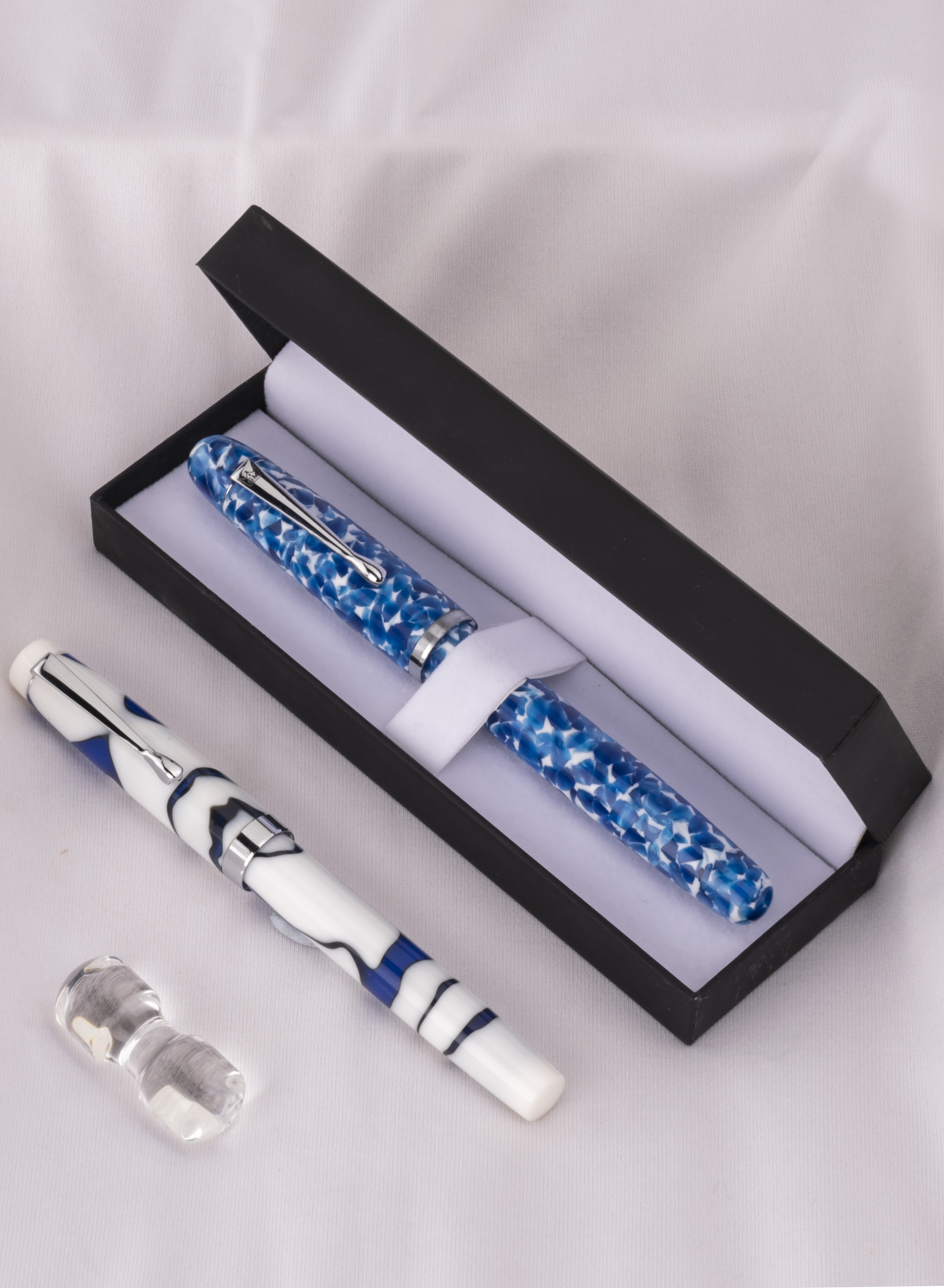 Blue marbled fountain pen in gift box — product photography